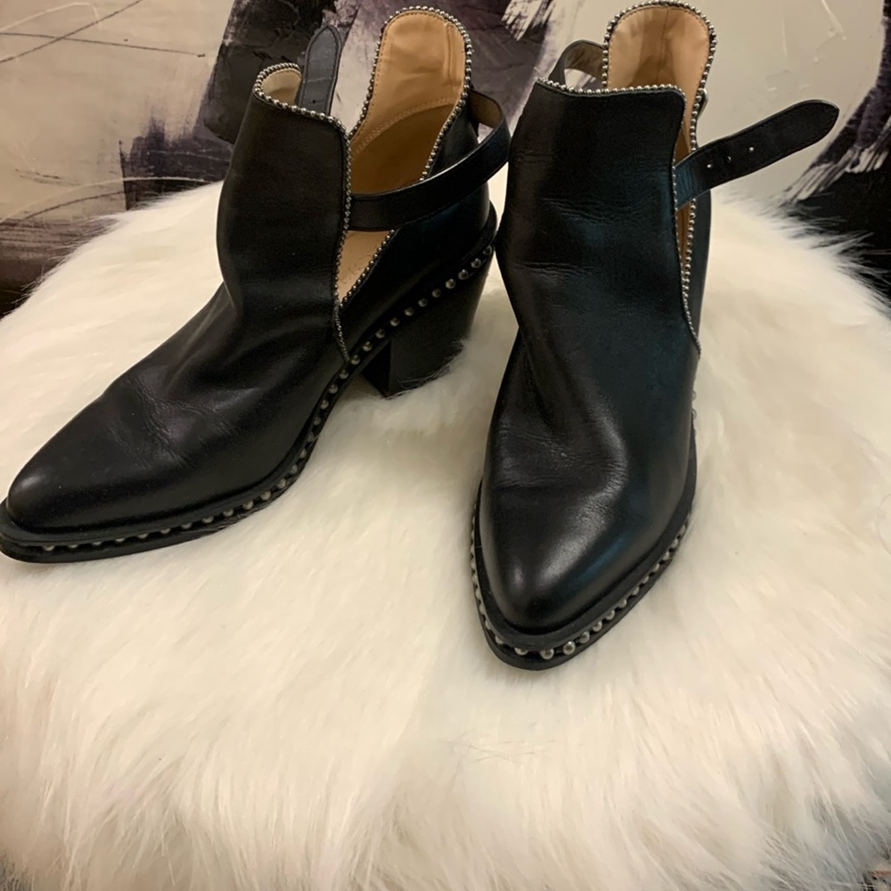 Coach leather western 🤠 ankle boots with stud detail.